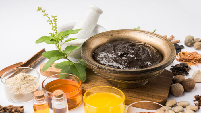 Indian Ayurvedic dietary supplement called Chyawanprash / chyavanaprasha is a cooked mixture of sugar, honey, ghee, Indian Gooseberry (amla), jam, sesame oil, berries, herbs and various spices Indian Ayurvedic dietary supplement called Chyawanprash / chyavanaprasha is a cooked mixture of sugar, honey, ghee, Indian Gooseberry (amla), jam, sesame oil, berries, herbs and various spices